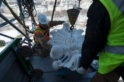 Workers with some statue