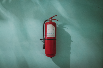 fire extinguisher on tthe wall