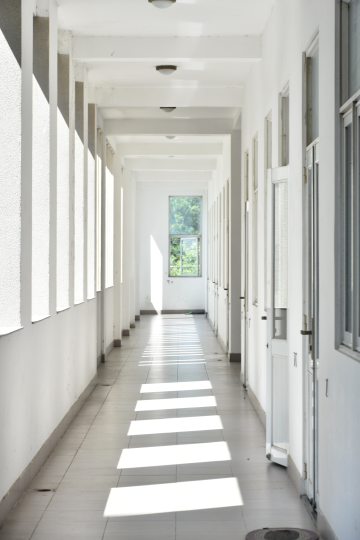 an empty white hallway