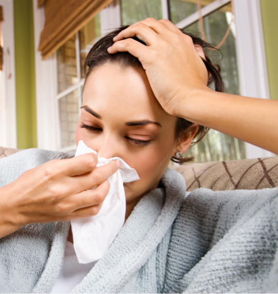 a person blowing their nose